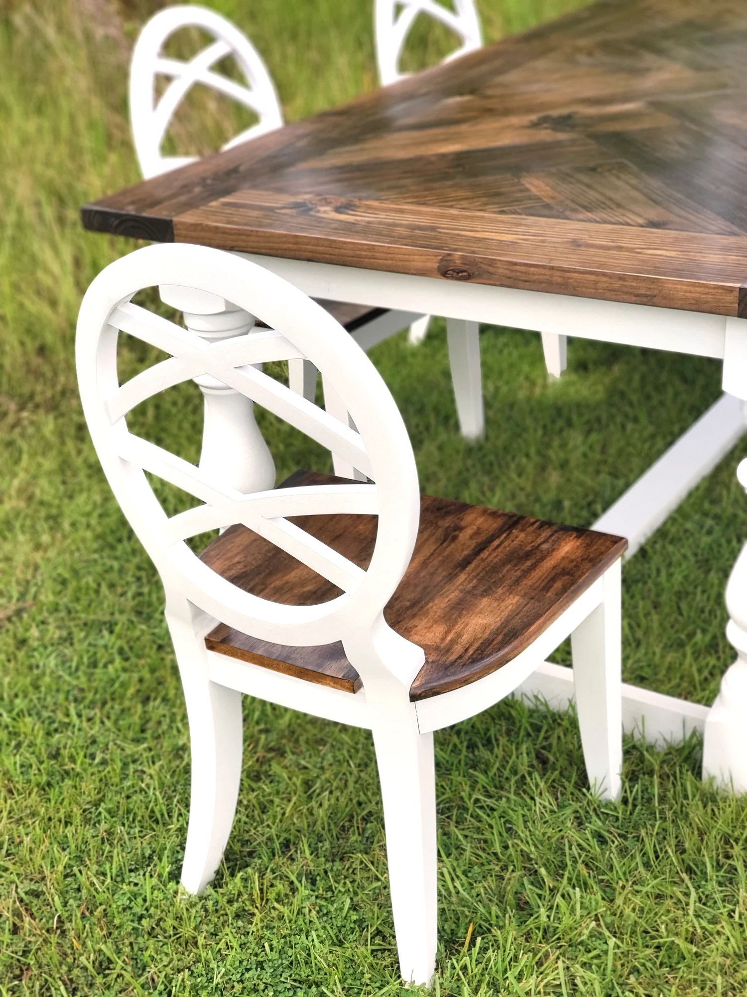 The herringbone tabletop and matching dark wood chair seat in the finished dining set