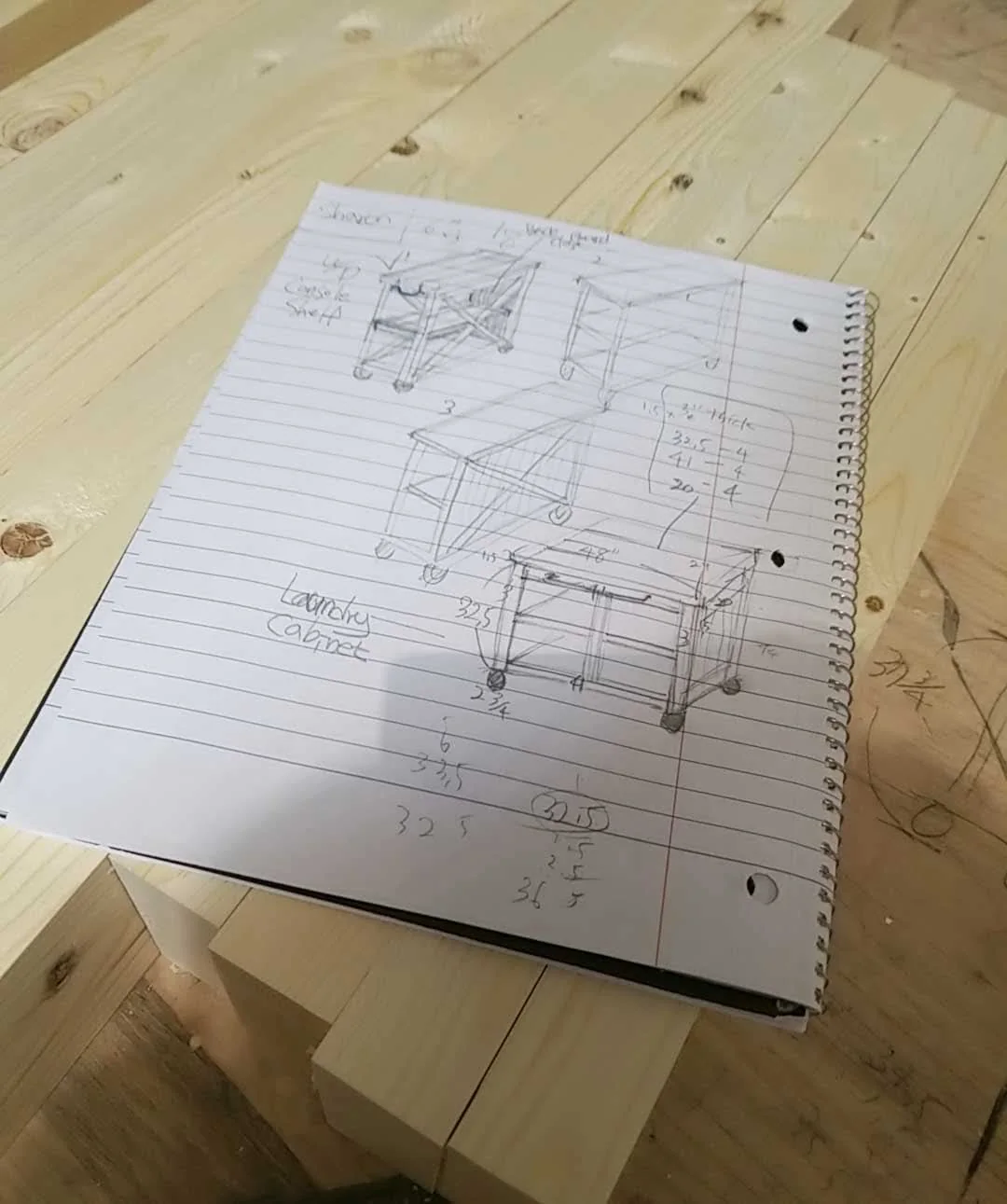 Joy's pencil sketches for the rolling laundry cabinet, including its open shelves, X side and casters